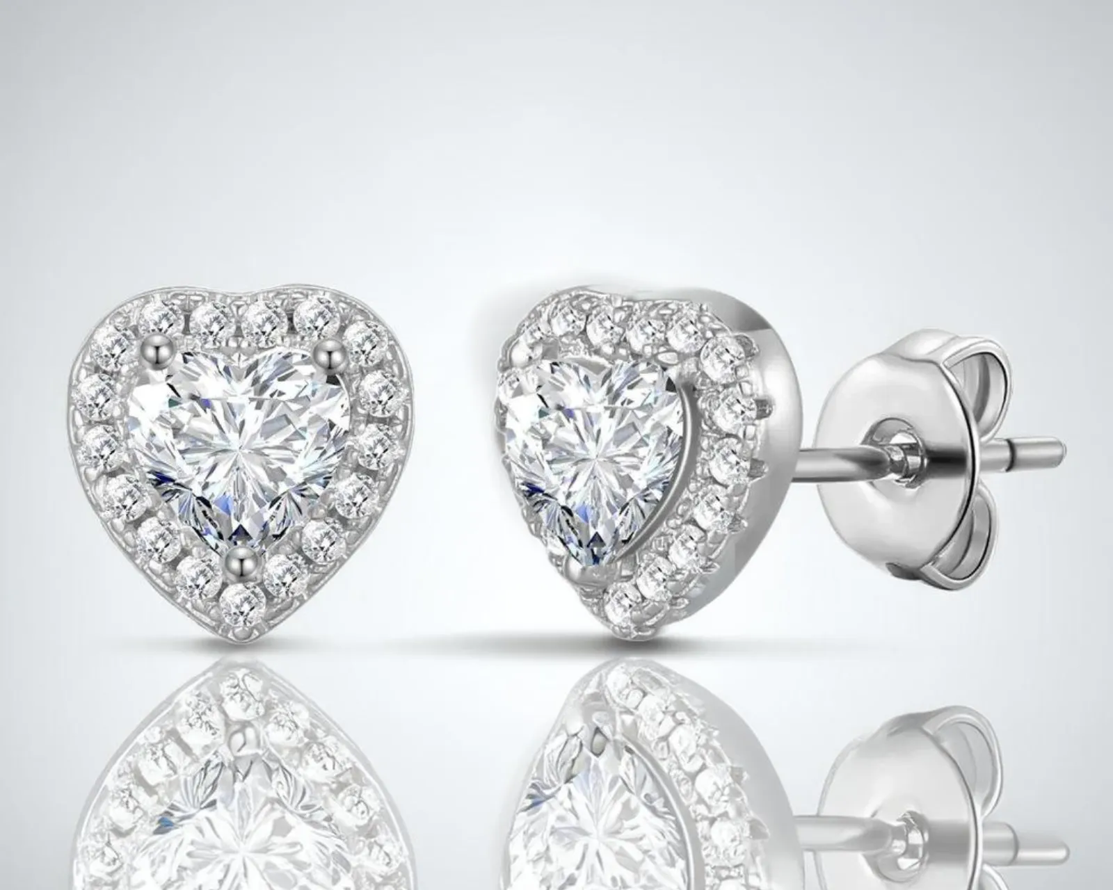 Fevani Heart shaped earstud earrings:Luminous Diamonds in 925 Sterling Silver